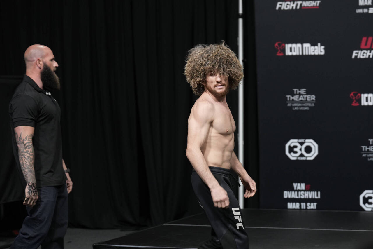 March 10, 2023, Las Vegas, NV, LAS VEGAS, NV, United States: LAS VEGAS, NV - MARCH 10: Merab Dvalishvili face-off and get into a pushing match foll...