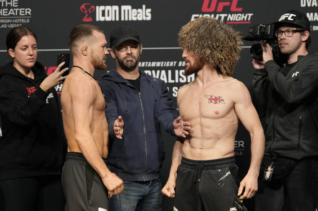 March 10, 2023, Las Vegas, NV, LAS VEGAS, NV, United States: LAS VEGAS, NV - MARCH 10: (L) Petr Yan and Merab Dvalishvili face-off and get into a p...
