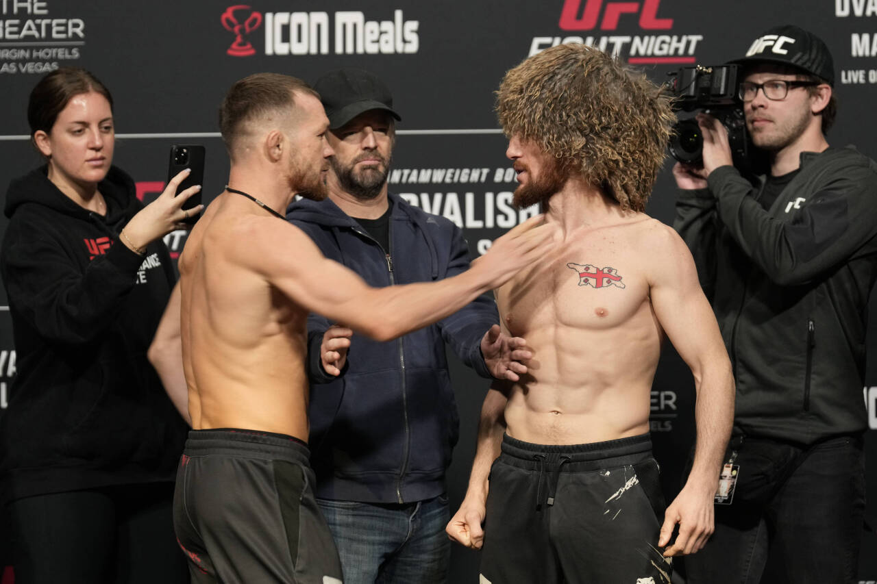 March 10, 2023, Las Vegas, NV, LAS VEGAS, NV, United States: LAS VEGAS, NV - MARCH 10: (L) Petr Yan and Merab Dvalishvili face-off and get into a p...