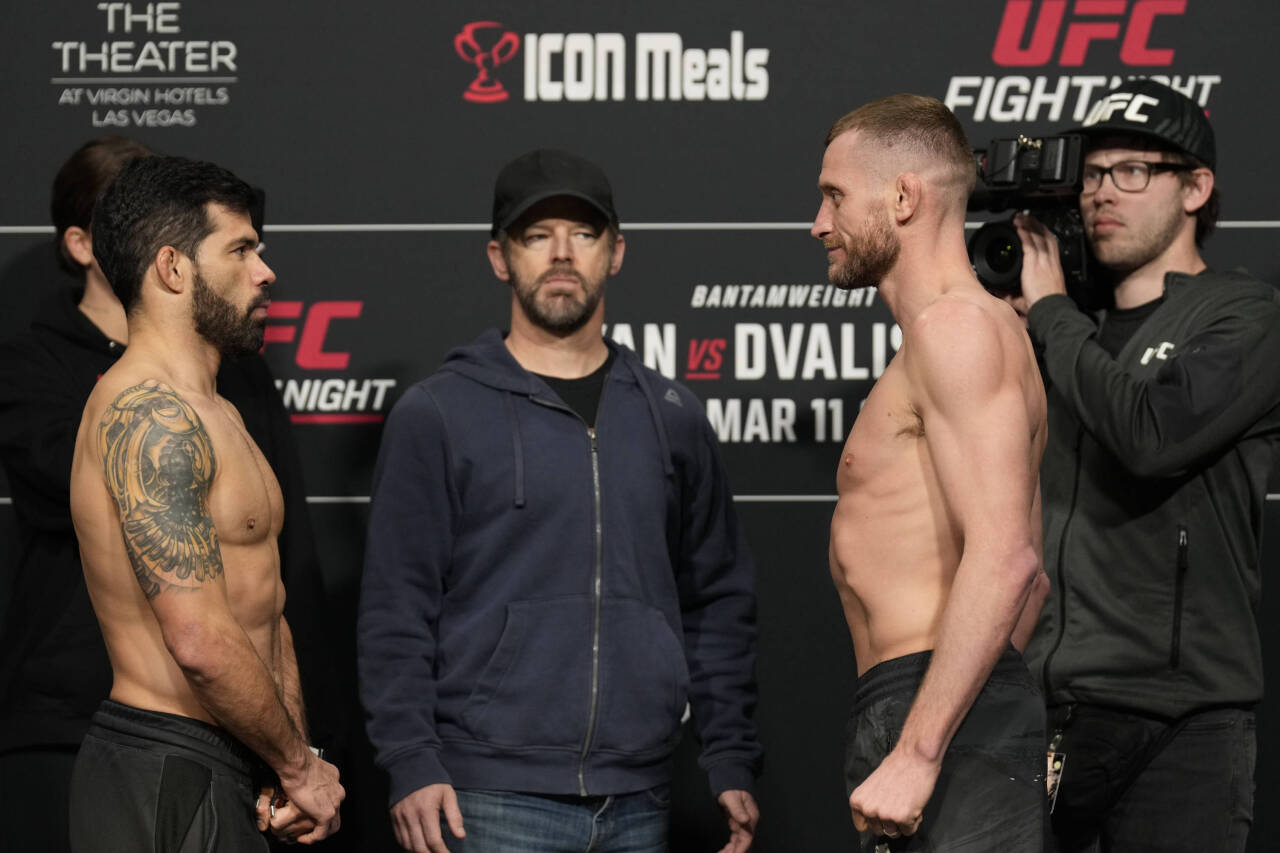 March 10, 2023, Las Vegas, NV, LAS VEGAS, NV, United States: LAS VEGAS, NV - MARCH 10: (L) Raphael Assuncao and Davey Grant face-off following the ...