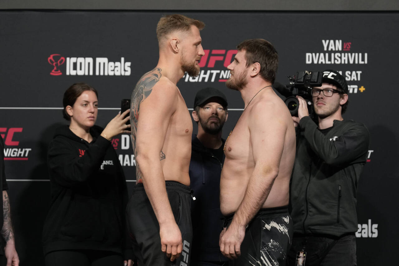March 10, 2023, Las Vegas, NV, LAS VEGAS, NV, United States: LAS VEGAS, NV - MARCH 10: (L) Alexander Volkov and Alexandr Romanov face-off following...