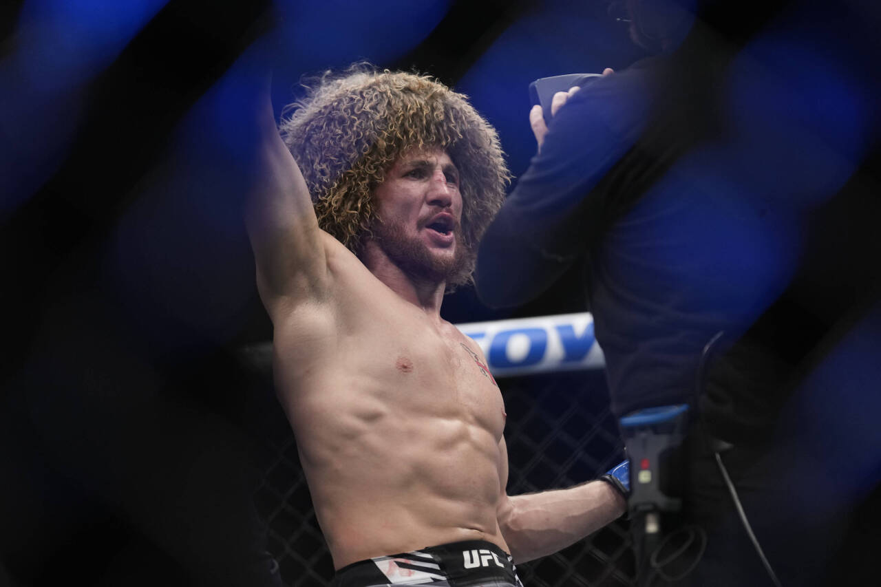 March 11, 2023, Las Vegas, NV, Las Vegas, NV, USA: LAS VEGAS, NV - MARCH 11: Merab Dvalishvili celebrates his victory over Petr Yan in their Bantam...
