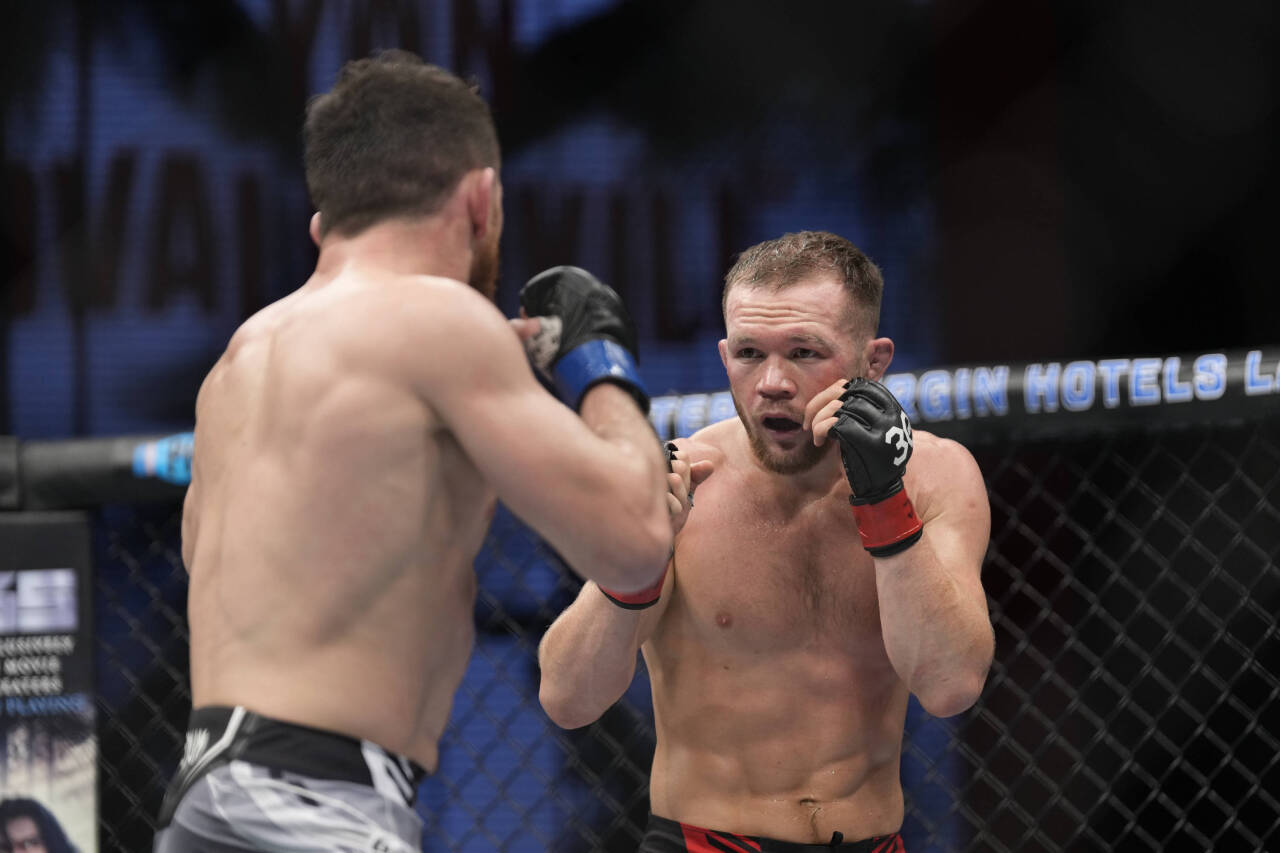 March 11, 2023, Las Vegas, NV, Las Vegas, NV, USA: LAS VEGAS, NV - MARCH 11: (L-R) Merab Dvalishvili battles Petr Yan in their Bantamweight fight d...