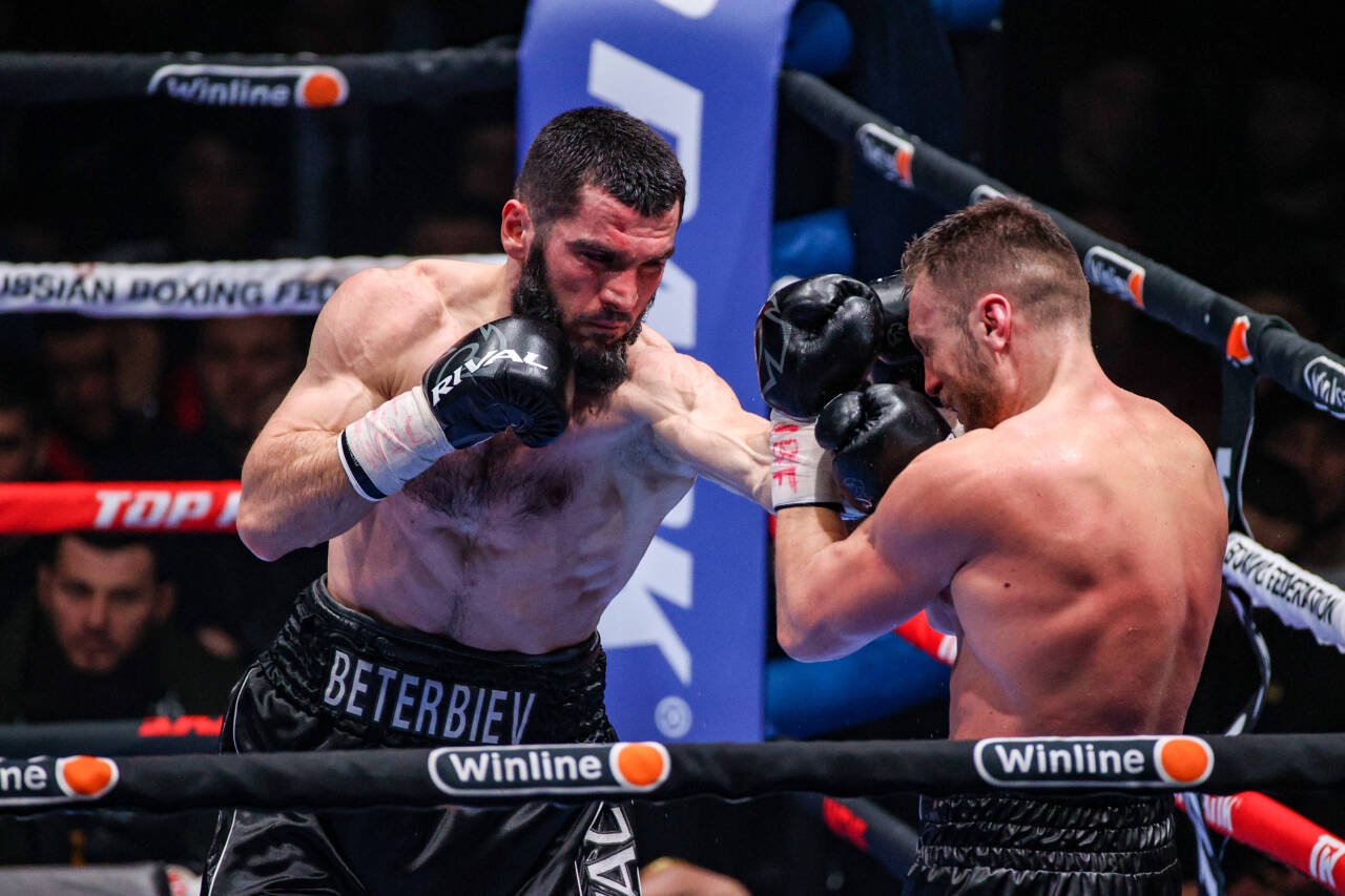 Russian boxer Artur Beterbiev and German boxer Adam Deines fight in their bout at Megasport Arena.
