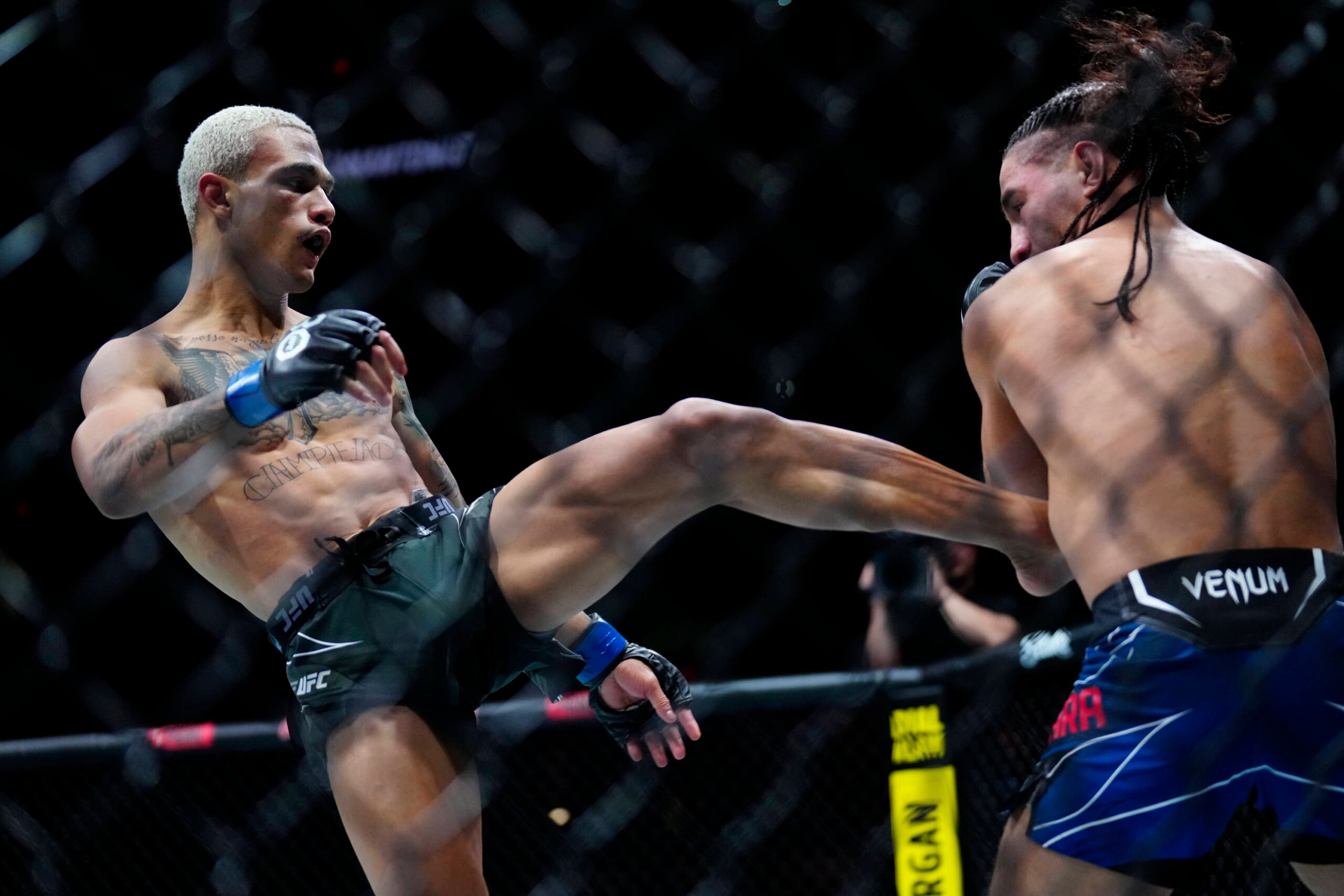 March 25, 2023, San Antonio, Texas, San Antonio, Texas, USA: SAN ANTONIO, TEXAS - MARCH 25: (L-R) Daniel da Silva kicks CJ Vergara in their Flyweig...