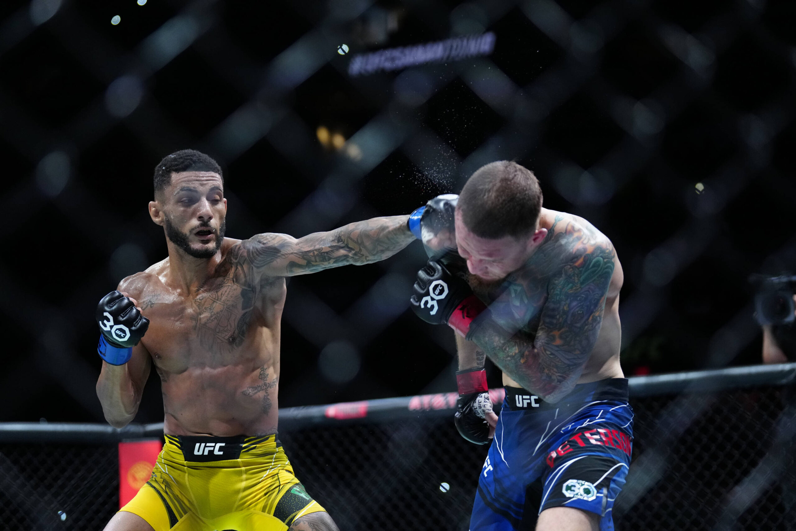 March 25, 2023, San Antonio, Texas, San Antonio, Texas, USA: SAN ANTONIO, TEXAS - MARCH 25: (L-R) Lucas Alexander punches Steven Peterson in their ...