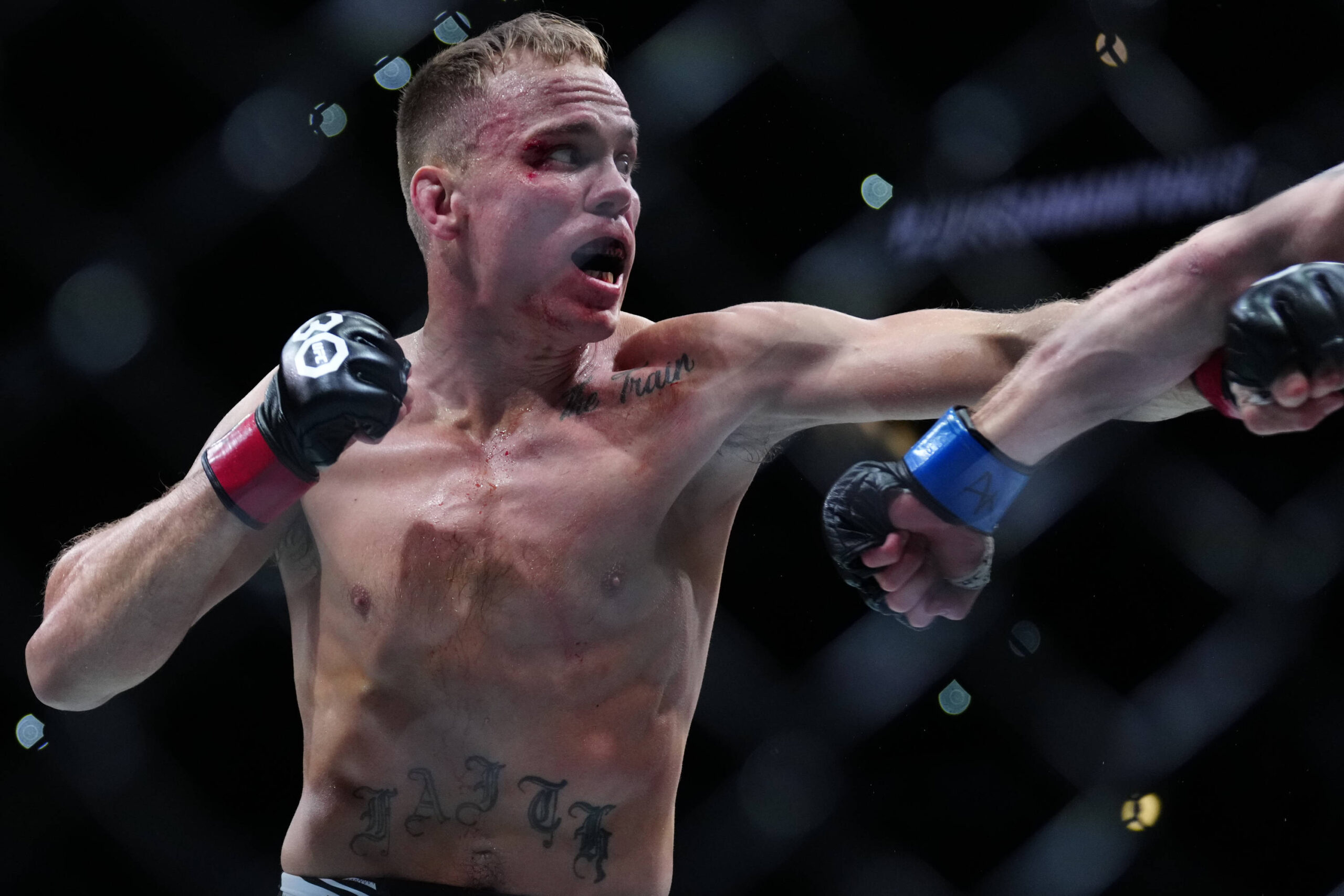 March 25, 2023, San Antonio, Texas, San Antonio, Texas, USA: SAN ANTONIO, TEXAS - MARCH 25: (L-R) Nate Landwehr punches Austin Lingo in their Feath...