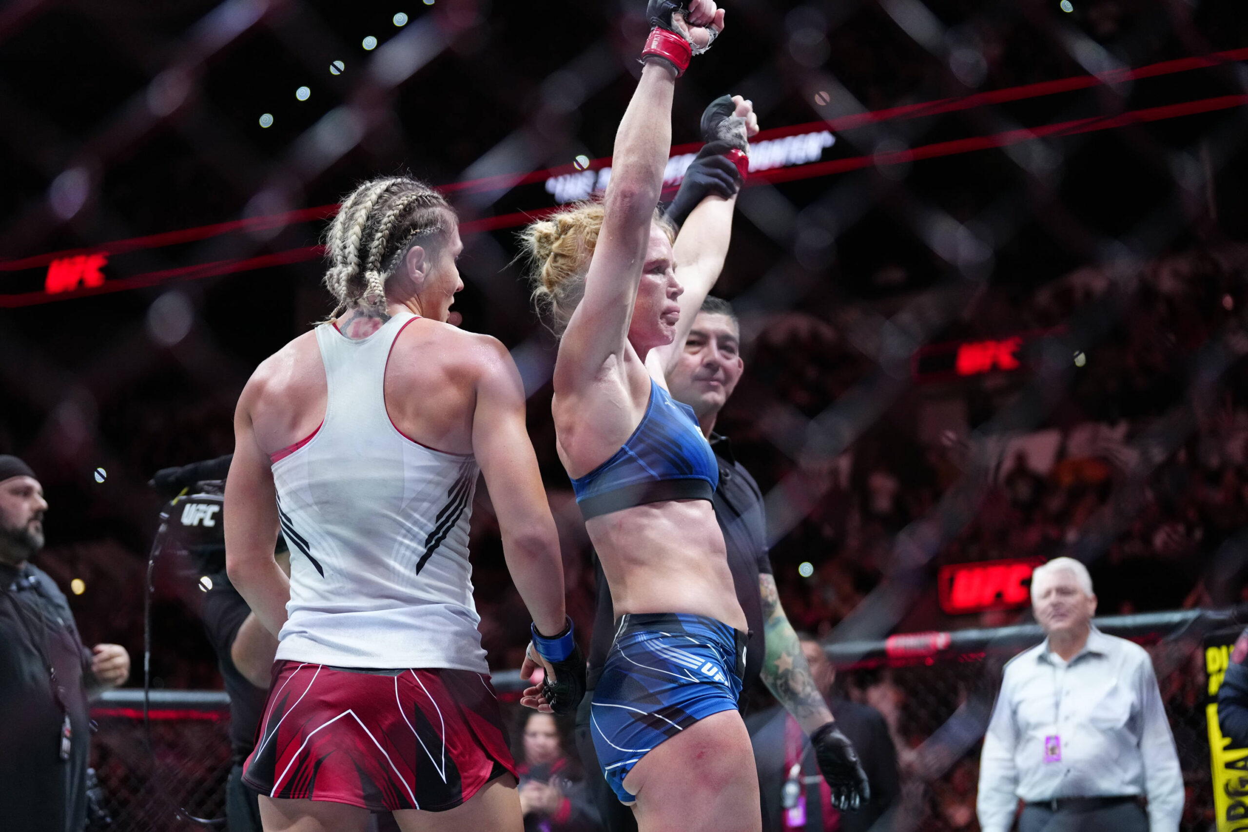 March 25, 2023, San Antonio, Texas, San Antonio, Texas, USA: SAN ANTONIO, TEXAS - MARCH 25: (R-L) Holly Holm celebrates her victory over Yana Santo...