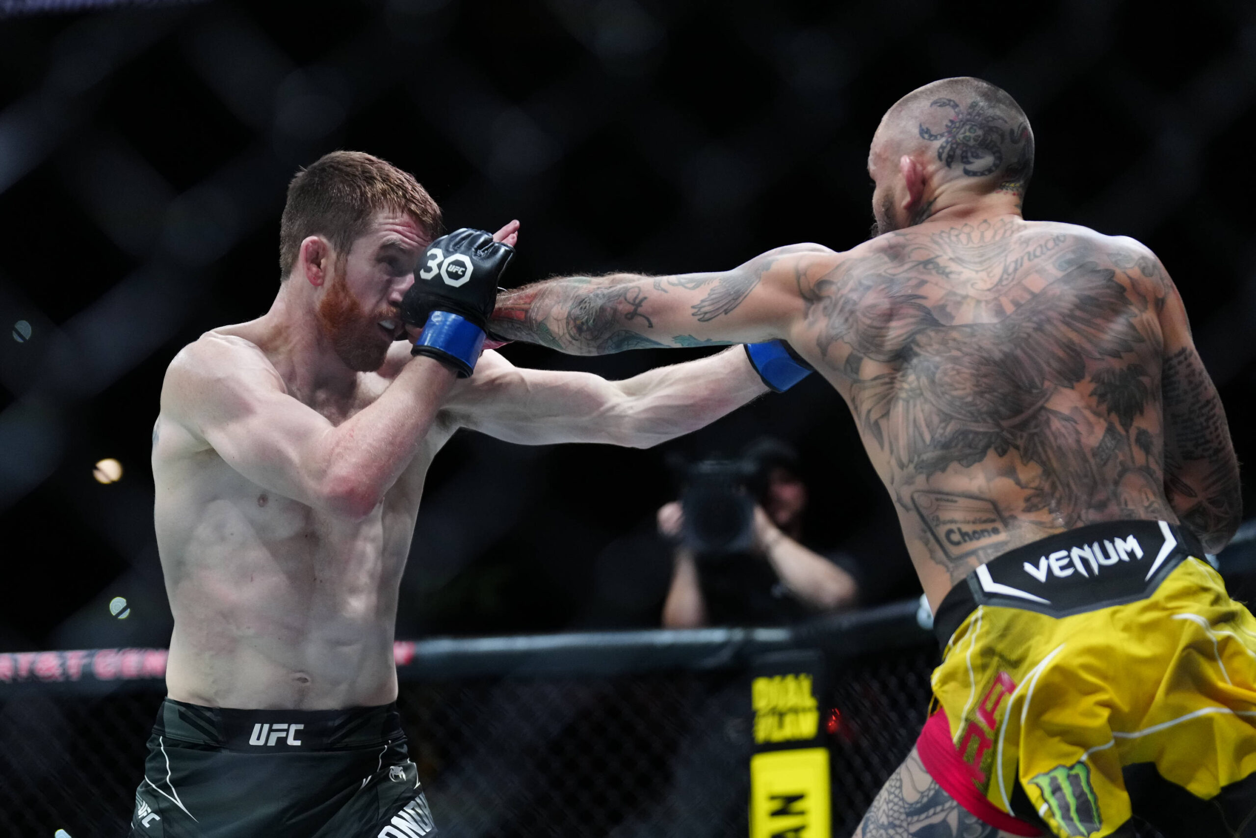 March 25, 2023, San Antonio, Texas, San Antonio, Texas, USA: SAN ANTONIO, TEXAS - MARCH 25: (R-L) Marlon Vera punches Cory Sandhagen in their Banta...