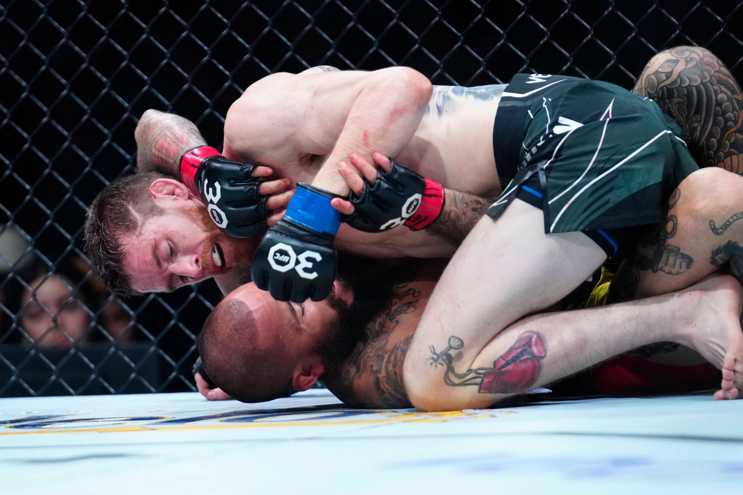 March 25, 2023, San Antonio, Texas, San Antonio, Texas, USA: SAN ANTONIO, TEXAS - MARCH 25: Cory Sandhagen (top) controls the body of Marlon Vera i...