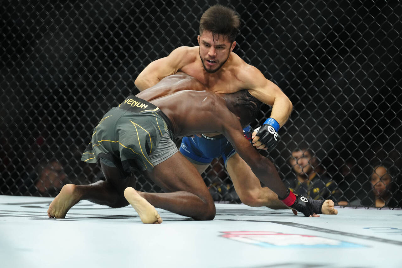 May 6, 2023, Newark, NJ, Newark, NJ, United States: Newark, NJ - May 6: (R-L) Henry Cejudo controls the body of Aljamain Sterling in a Bantamweight...