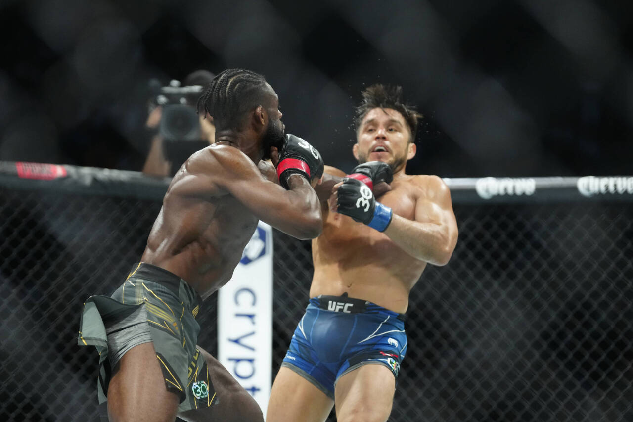 May 6, 2023, Newark, NJ, Newark, NJ, United States: Newark, NJ - May 6: (L-R) Aljamain Sterling punches Henry Cejudo in a Bantamweight bout at UFC ...