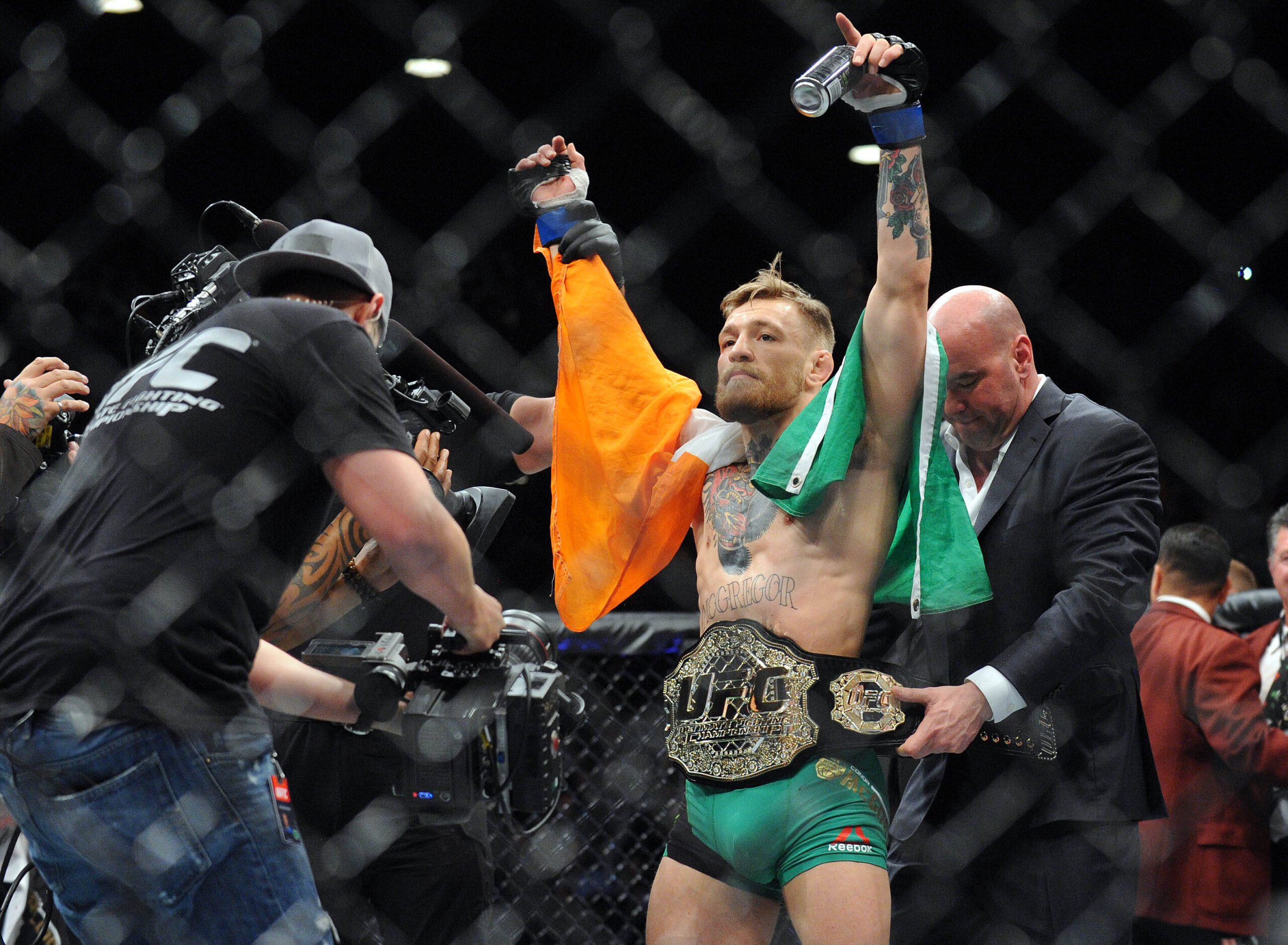 MMA: UFC 194-Aldo vs McGregor December 12, 2015; Las Vegas, NV, USA; Conor McGregor is declared the winner by knockout and crowned champion against...