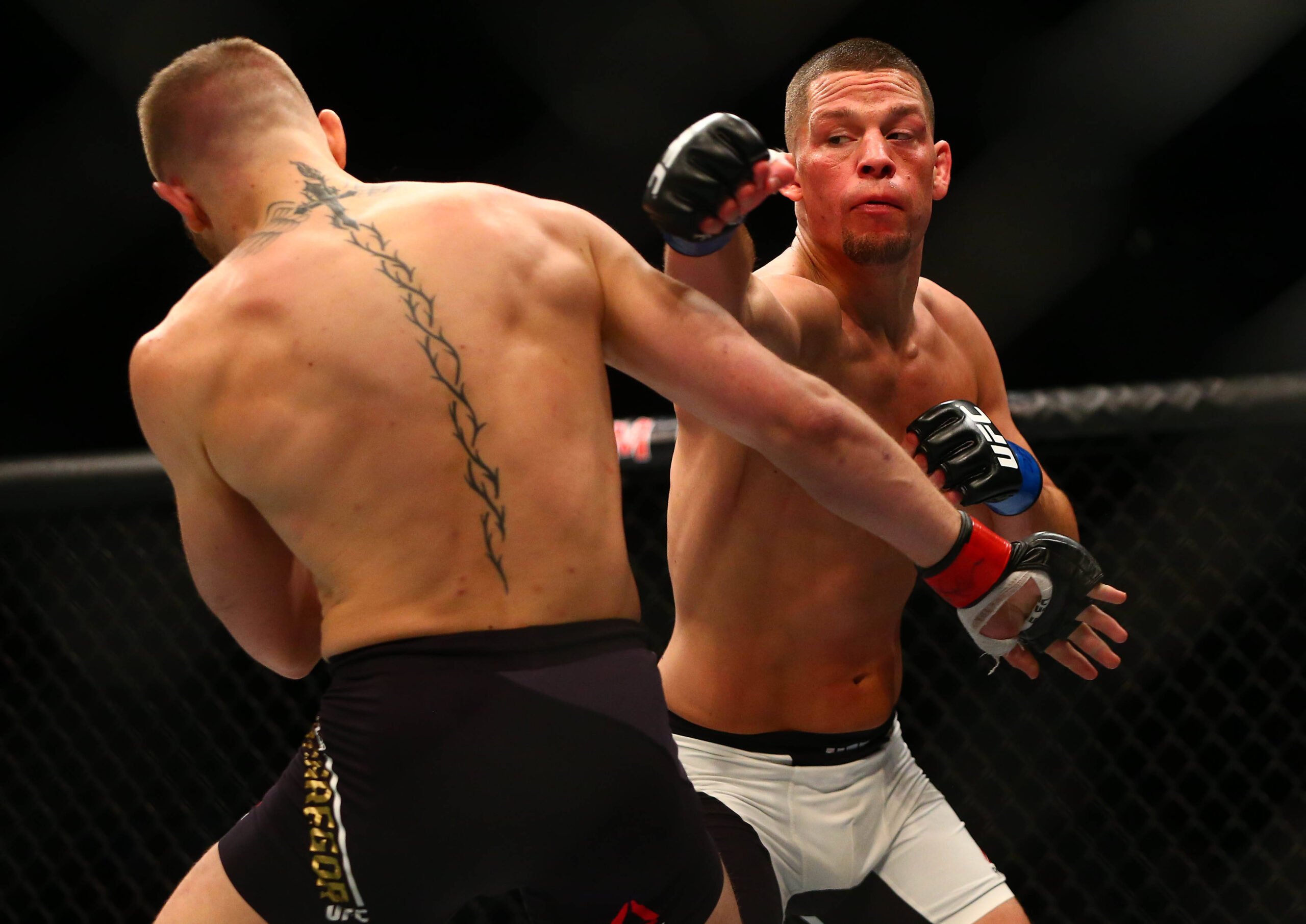 MMA: UFC 196-McGregor vs Diaz, March 5, 2016; Las Vegas, NV, USA; Nate Diaz moves in with a punch against Conor McGregor during UFC 196 at MGM Gran...