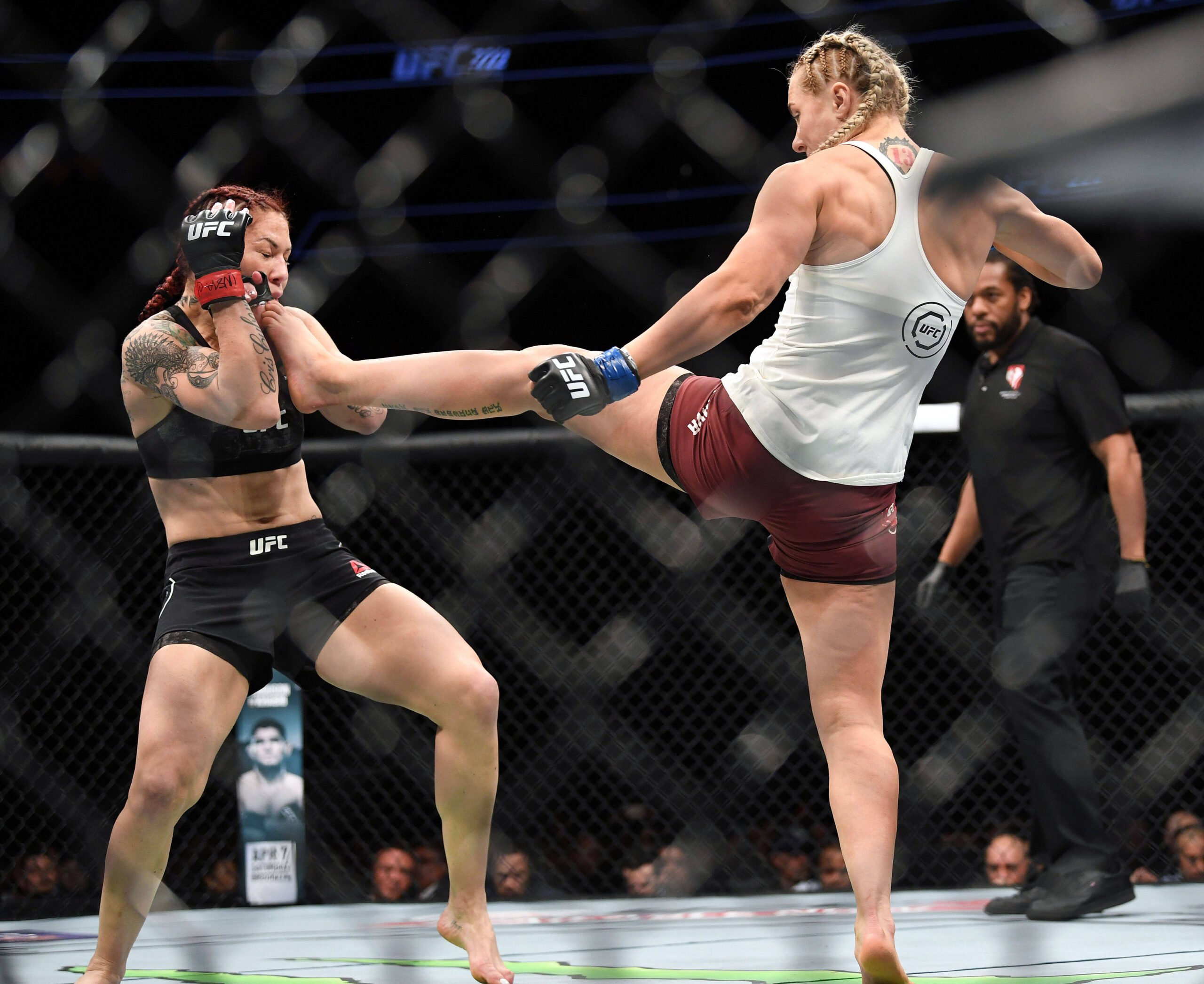 MMA: UFC 222-Cyborg vs Kunitskaya, Mar 3, 2018; Las Vegas, NV, USA; Yana Kunitskaya lands a kick against Cris Cyborg during UFC 222 at T-Mobile Are...