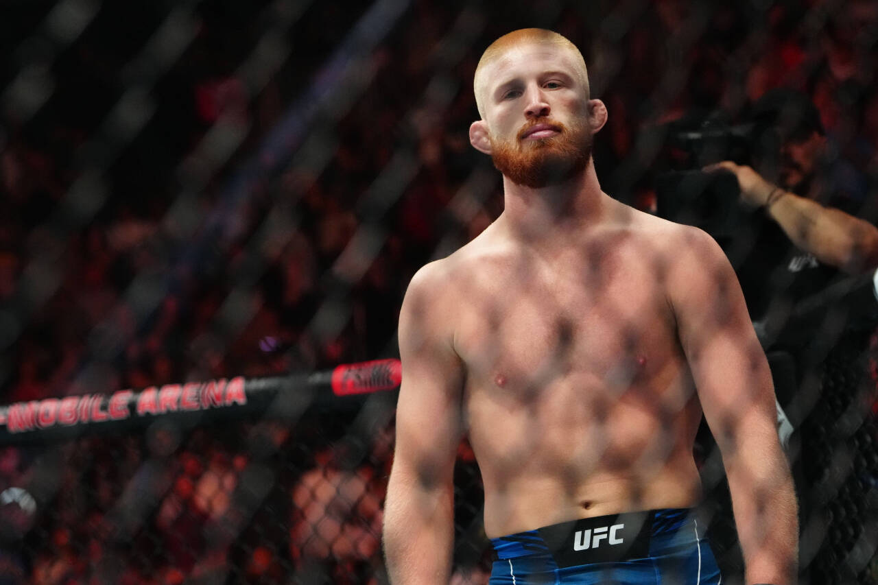 MMA: UFC 290 - Nickal vs Woodburn Jul 8, 2023; Las Vegas, Nevada, USA; Bo Nickal (red gloves) reacts to defeating Val Woodburn (blue gloves) during...