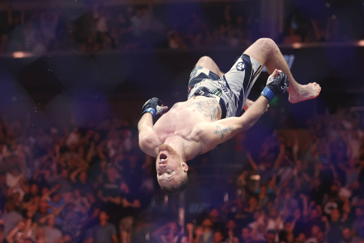 MMA: UFC 291 - Poirier vs Gaethje Jul 29, 2023; Salt Lake City, Utah, USA; Justin Gaethje (blue gloves) reacts to defeating Dustin Poirier (red glo...