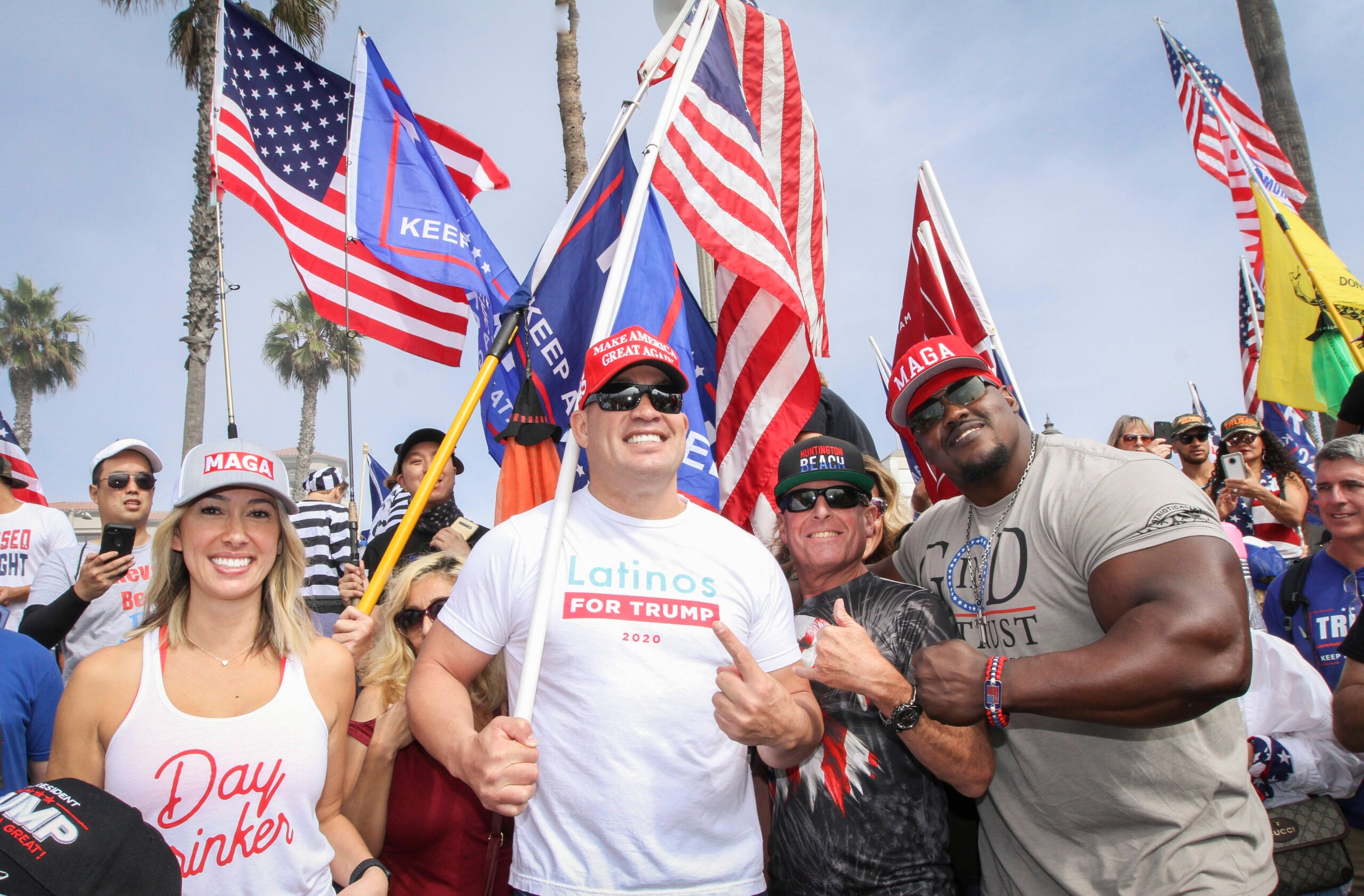 October 31, 2020, Huntington Beach, California, USA: Trump evangelist, MMA legend TITO ORTIZ, 45, wearing a LATINOS FOR TRUMP t-shirt, leads a mass...