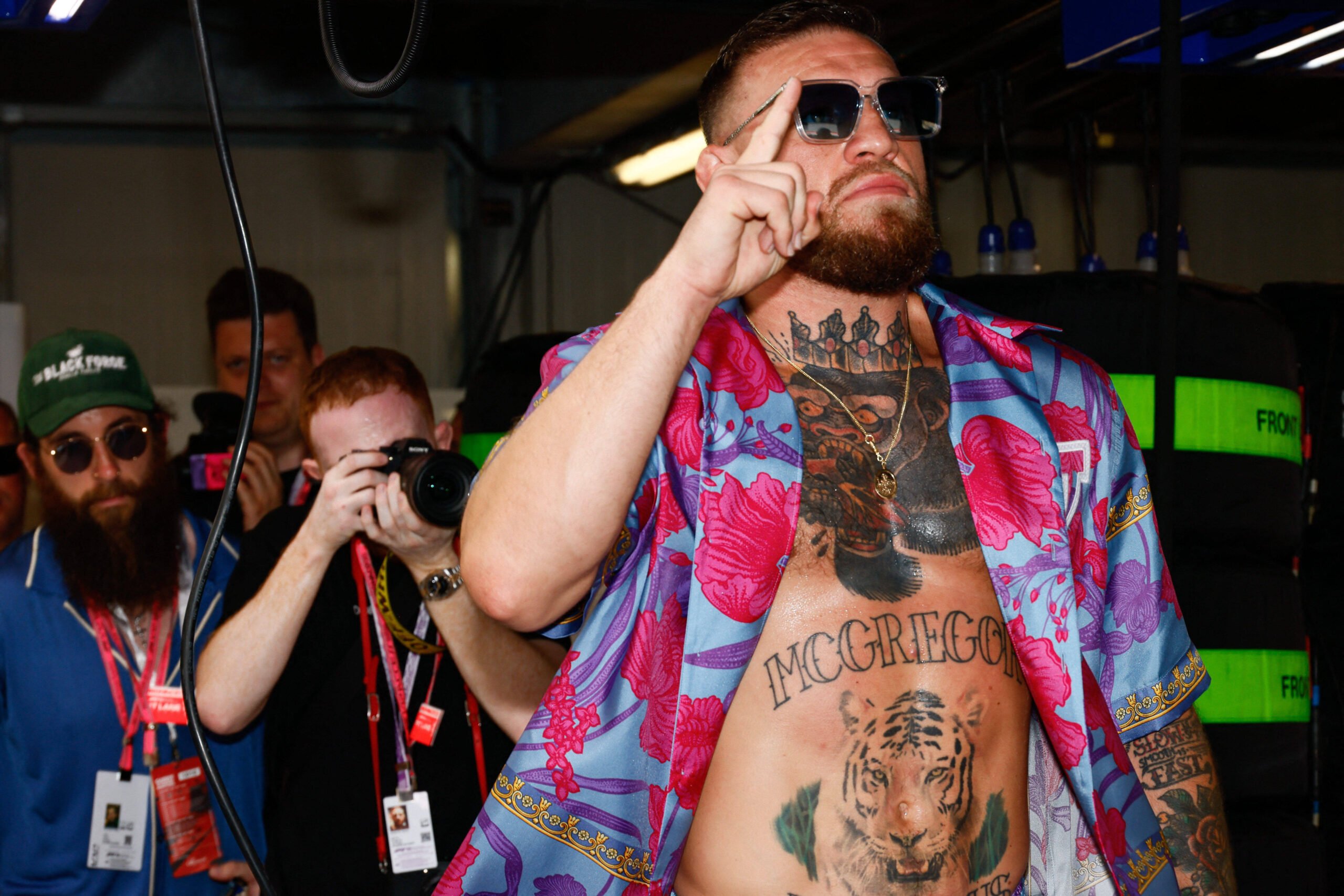 VIPs Attend Monaco Grand Prix Conor McGregor go to visit his friend driver Kevin Jan Magnussen at Hass paddock, along pit lane during the F1 Gran P...