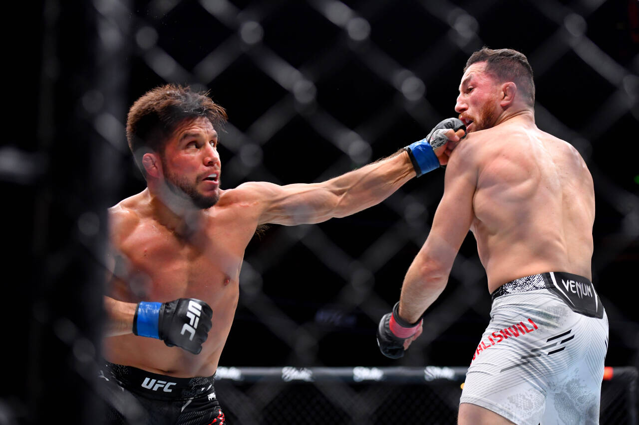 Former UFC champion Henry Cejudo punches Merab Dvashvili during UFC 298 at the Honda Center in Anaheim, California Anaheim USA - ZUMA