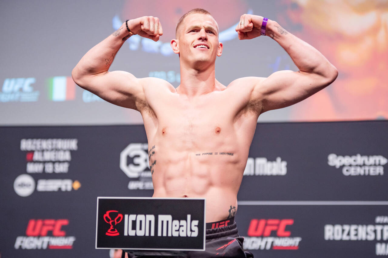 May 12, 2023, Charlotte, NC, North Carolina, USA: CHARLOTTE, NORTH CAROLINA - May 12: Ian Machado Garry poses on the scales at ceremonial weigh ins...