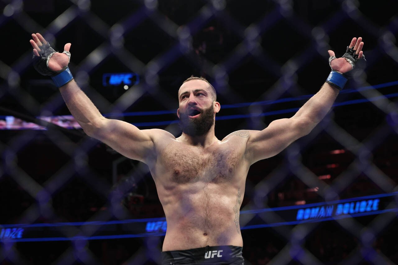MMA: UFC Fight Night - Orlando - Hermansson vs Dolidze Dec 3, 2022; Orlando, Florida, USA; Roman Dolidze (blue gloves) reacts after fighting Jack H...