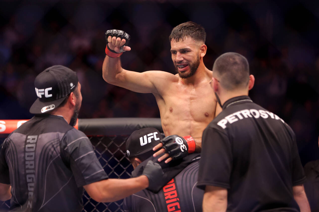 Yair Rodriguez of Mexico celebrates after winning his fight against Josh Emmett of the USA during their Featherweight interim title bout at UFC 284...