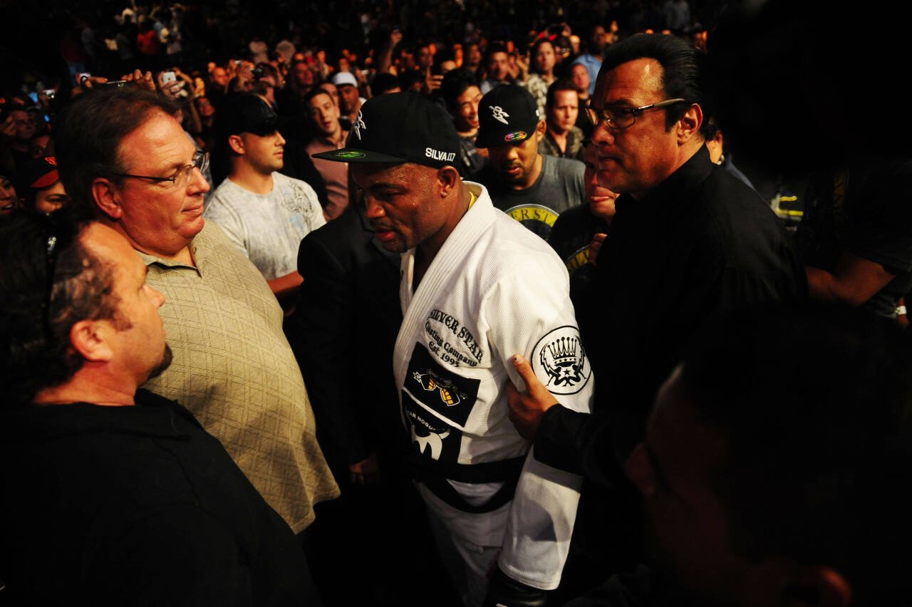 US PRESSWIRE Sports Aug. 7, 2010; Oakland, CA, USA; MMA star and UFC fighter Anderson Silva (center) is congratulated by Steven Seagal (right) walk...