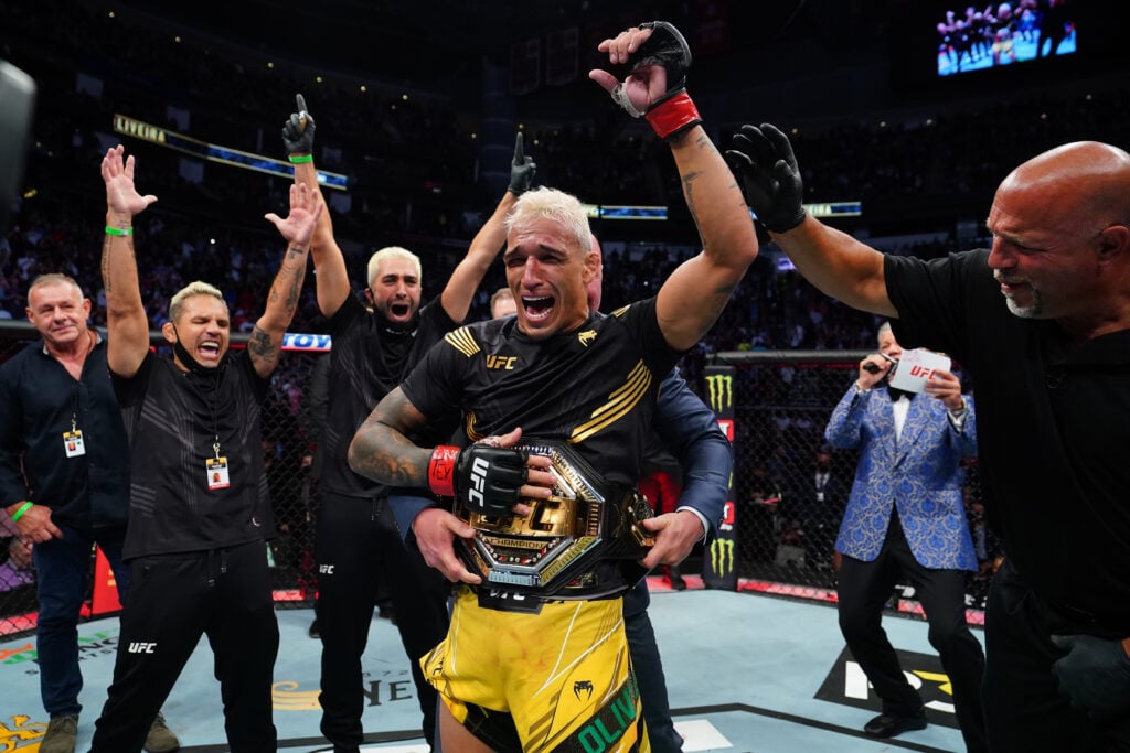 Charles Oliveira has the lightweight title wrapped around his waist after beating Michael Chandler at UFC 262
