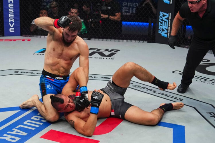 Magomed Umalatov throws a punch against Nayib Lopez during PFL 2023 week 6 at OTE Arena on June 23, 2023 in Atlanta, Georgia.