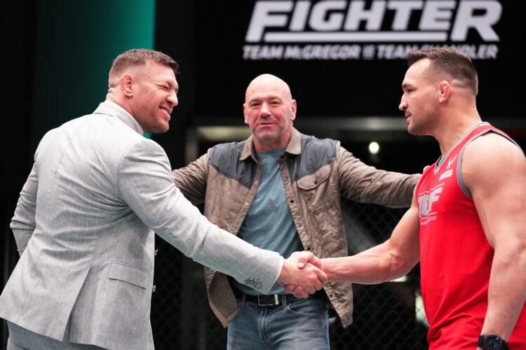 (L-R) Conor McGregor and Michael Chandler shake hands during the filming of The Ultimate Fighter at UFC APEX on March 13, 2023 in Las Vegas, Nevada.