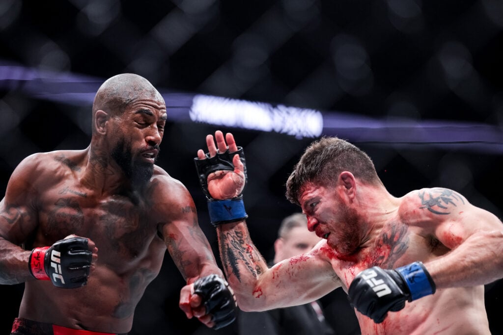 Bobby Green punches Jim Miller during their UFC 300 fight
