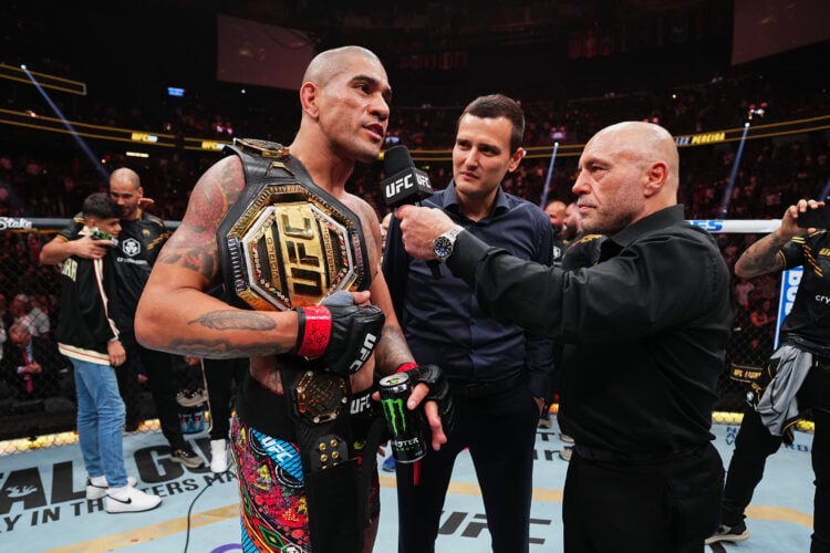 (R-L) Joe Rogan interviews Alex Pereira of Brazil in the UFC light heavyweight championship fight during the UFC 300 event at T-Mobile Arena on Apr...