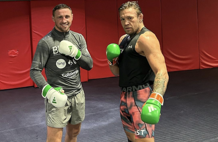 Brendan Loughnane (l) poses after a training session with Conor McGregor (r)