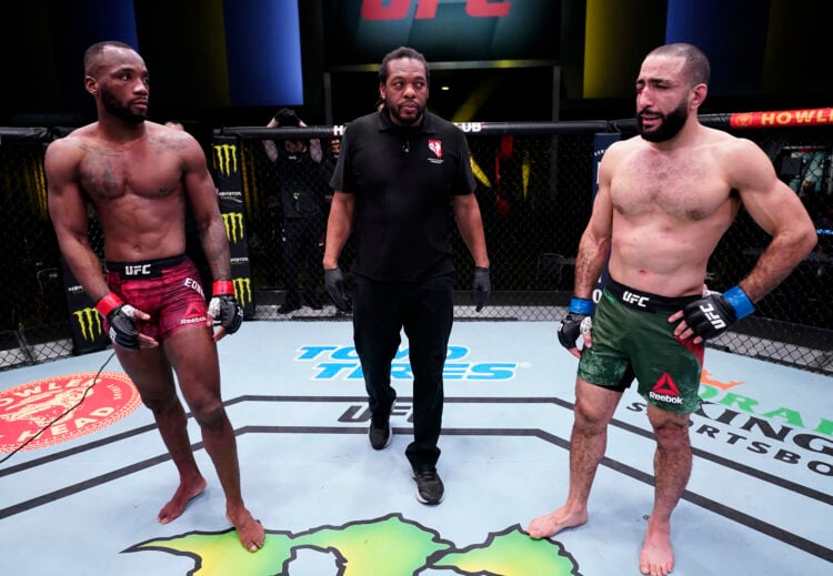 Referee Herb Dean declares the fight between Bulal Muhammad (R) and Leon Edwards (L) of Jamaica a no-contest after Muhammad was unable to continue ...