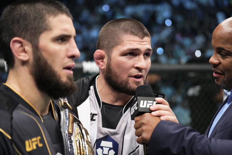 Khabib Nurmagomedov reacts after his teammate Islam Makhachev of Russia wins the UFC lightweight championship fight during the UFC 280 event at Eti...