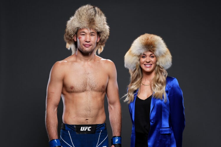 Shavkat Rakhmonov of Uzbekistan poses with Laura Sanko for a portrait after his victory during the UFC 285 event at T-Mobile Arena on March 04, 202...