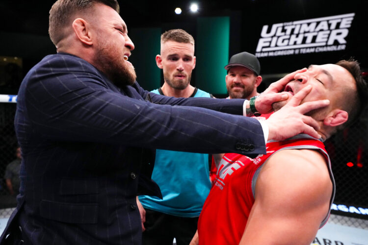 (L-R) Conor McGregor pushes Michael Chandler during the filming of The Ultimate Fighter at UFC APEX on March 03, 2023 in Las Vegas, Nevada.