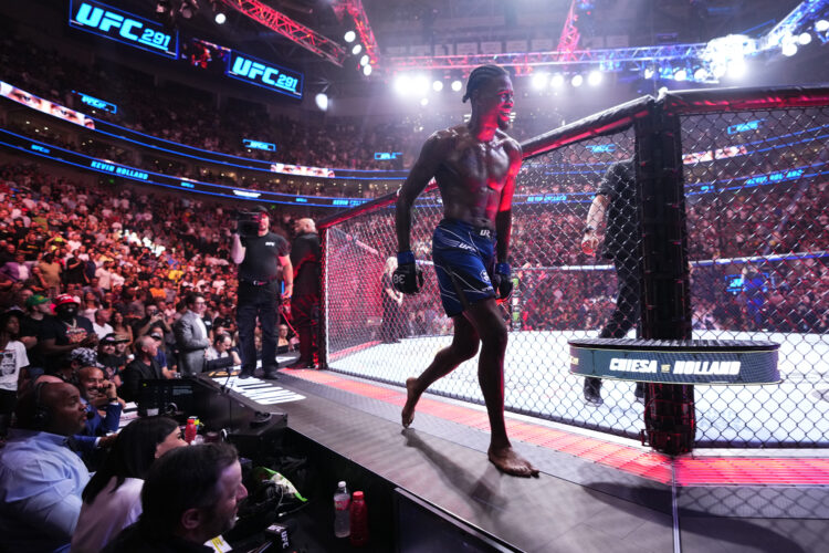 Kevin Holland celebrates his submission victory over Michael Chiesa in a welterweight fight during the UFC 291 event at Delta Center on July 29, 20...