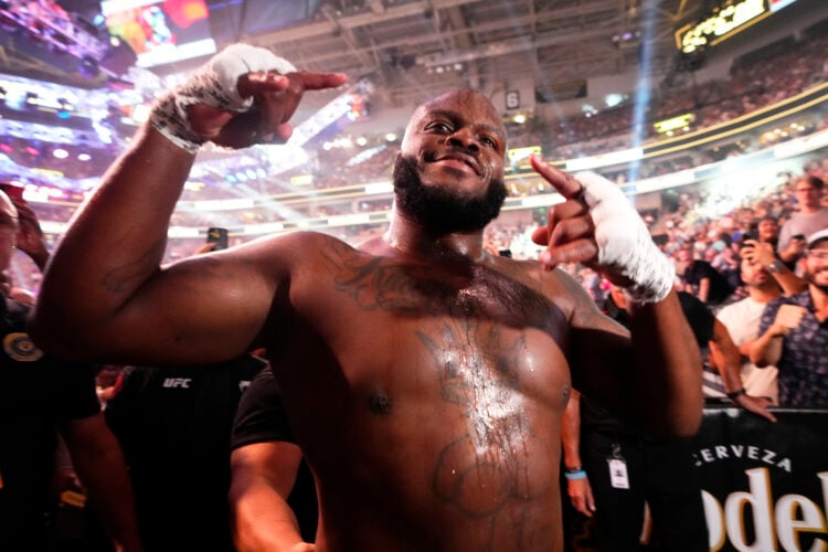 Derrick Lewis celebrates his victory over Marcos Rogerio de Lima of Brazil in a heavyweight fight during the UFC 291 event at Delta Center on July ...