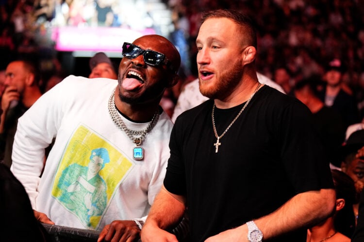 (L-R) Former UFC Welterweight champion Kamaru Usman and Justin Gathje attend the UFC 296 event at T-Mobile Arena on December 16, 2023 in Las Vegas,...