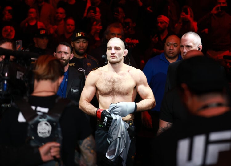 Sean Strickland of the United States makes his way to the octagon for his middleweight title bout against Dricus Du Plessis of South Africa during ...