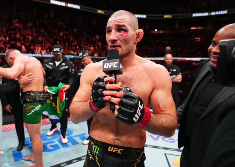 Sean Strickland reacts after his loss against Dricus Du Plessis of South Africa in a UFC middleweight championship bout during the UFC 297 event at...