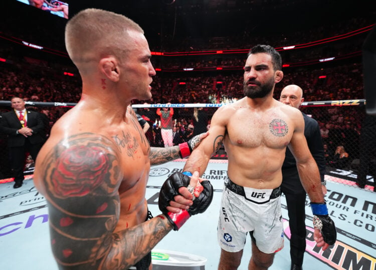 (L-R) Dustin Poirier and Benoit Saint Denis of France talk after their lightweight fight during the UFC 299 event at Kaseya Center on March 09, 202...