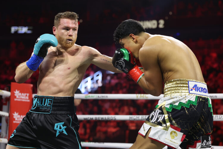 Canelo Alvarez throws a left against Jaime Munguia in their super middleweight championship title fight at T-Mobile Arena on May 04, 2024 in Las Ve...