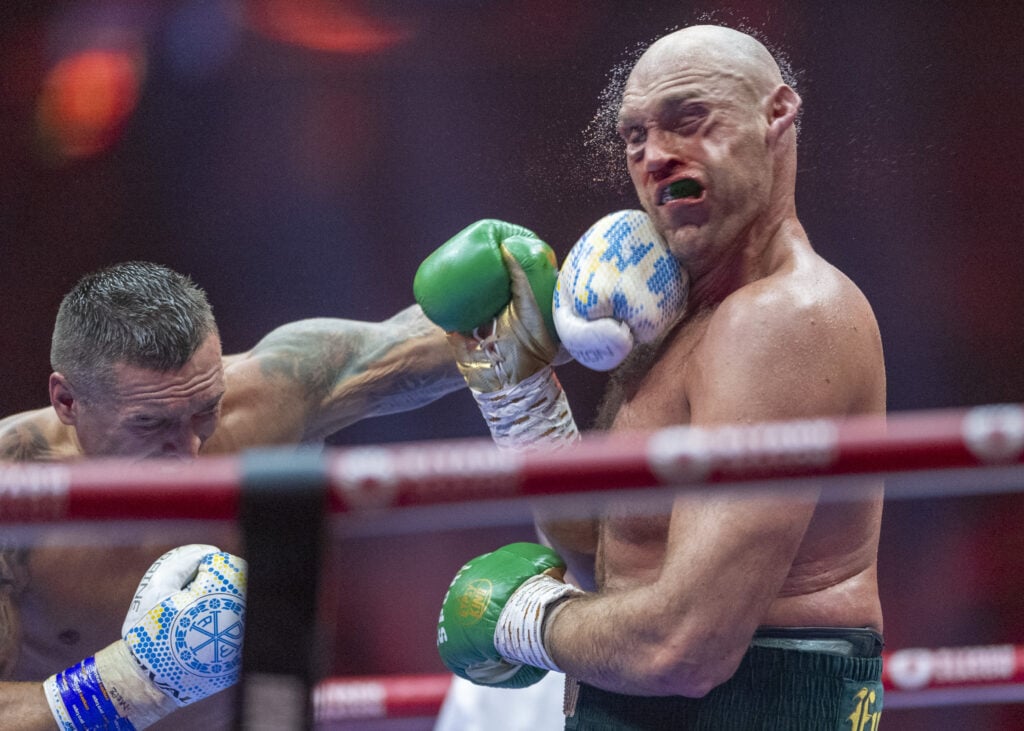 Oleksandr Usyk lands a clean punch on Tyson Fury during their boxing match