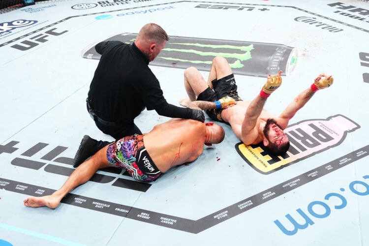 Islam Makhachev of Russia reacts after his submission victory against Dustin Poirier in the UFC lightweight championship fight during the UFC 302 e...