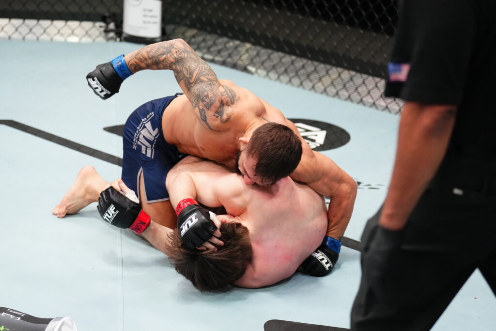 Kaan Ofli punches Nathan Fletcher in their The Ultimate Fighter bout