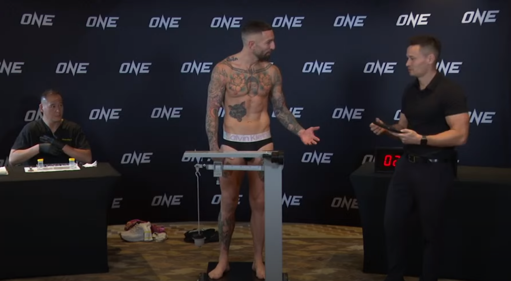 Liam Harrison argues at ONE 167 weigh in