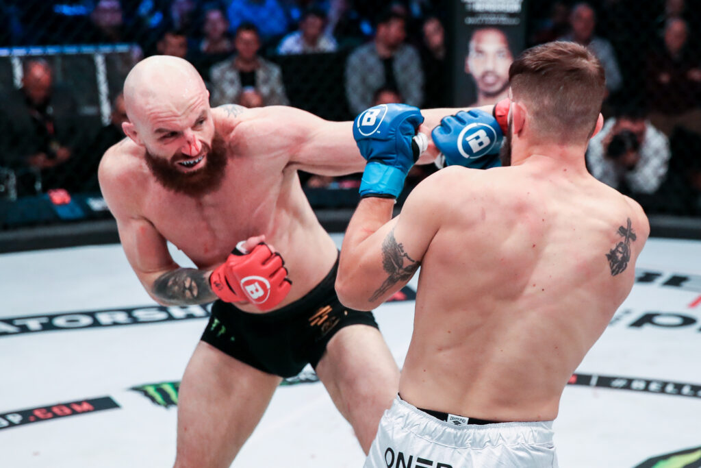 Peter Queally throwing a punch during a Bellator fight